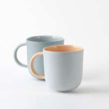 mug-pair-blue-apricot-sage a pair of large coffee cups