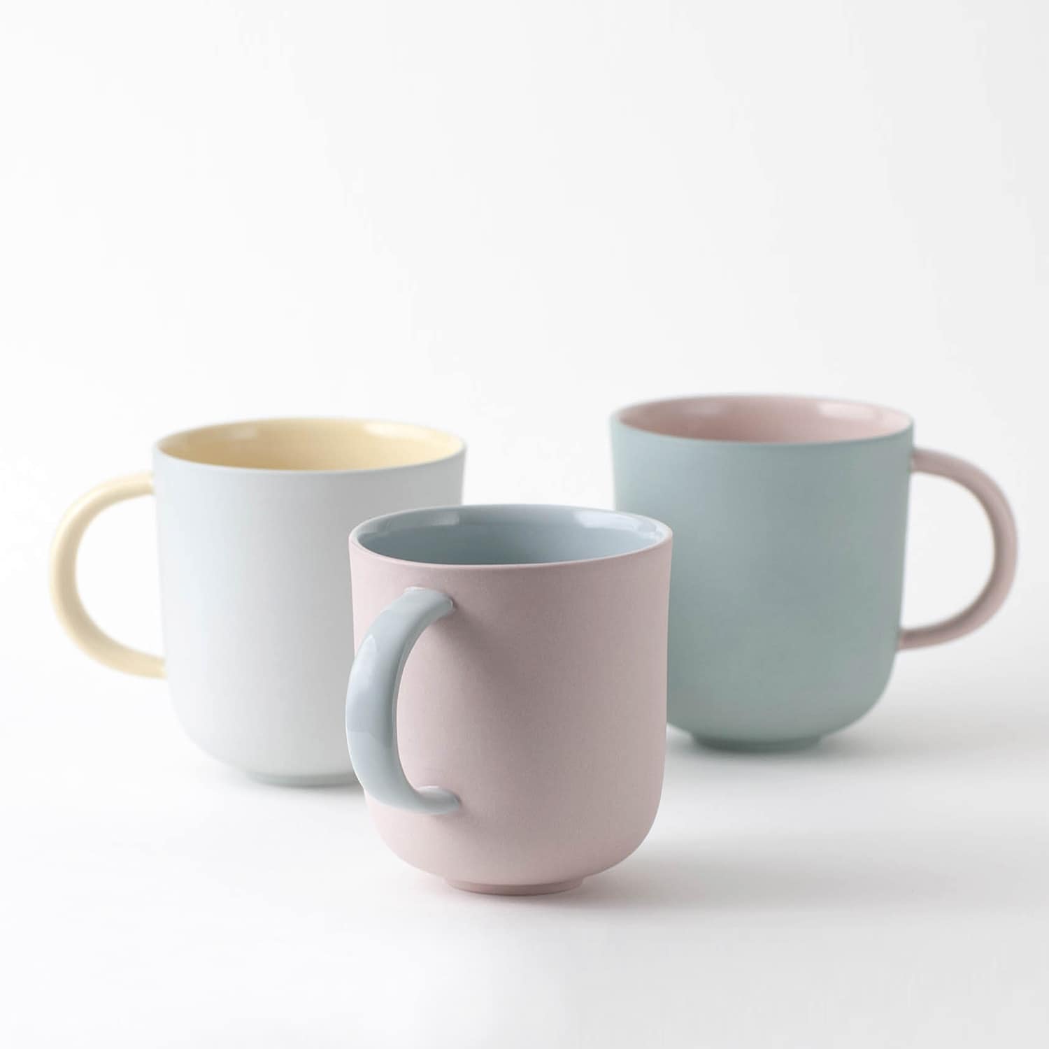 https://www.clayful.design/wp-content/uploads/2022/04/mug-trio-pink-blue-yellow-sage.jpg