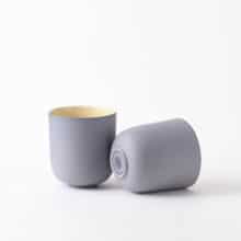 a pair of minimal cups size tall