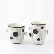 buttons-bw-pair a pair of unusual cups