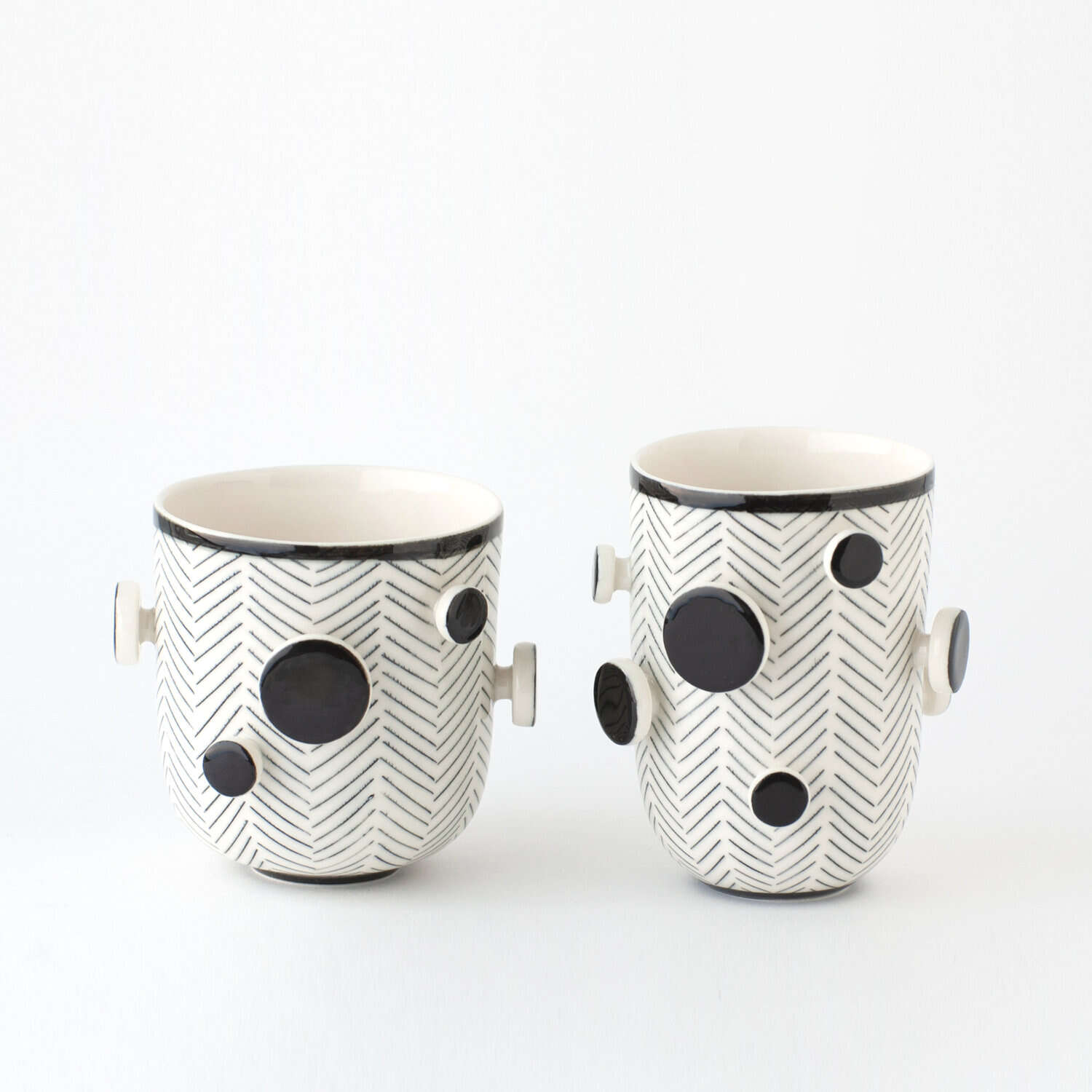 a pair of unusual cups