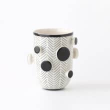 buttons-bw-tall black and white cup with round knobs-handles