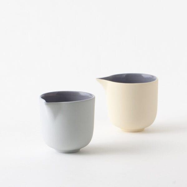 minimal-creamer-pair-yellow-blue-blueberry two small creamers