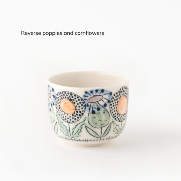 Swedish-Summer-color-reverse-poppy-corn cup with poppies and cornflowers