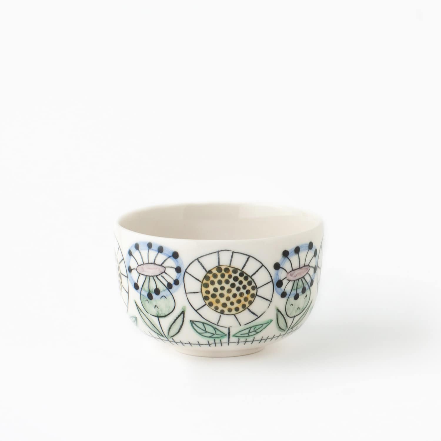 small cup with floral pattern